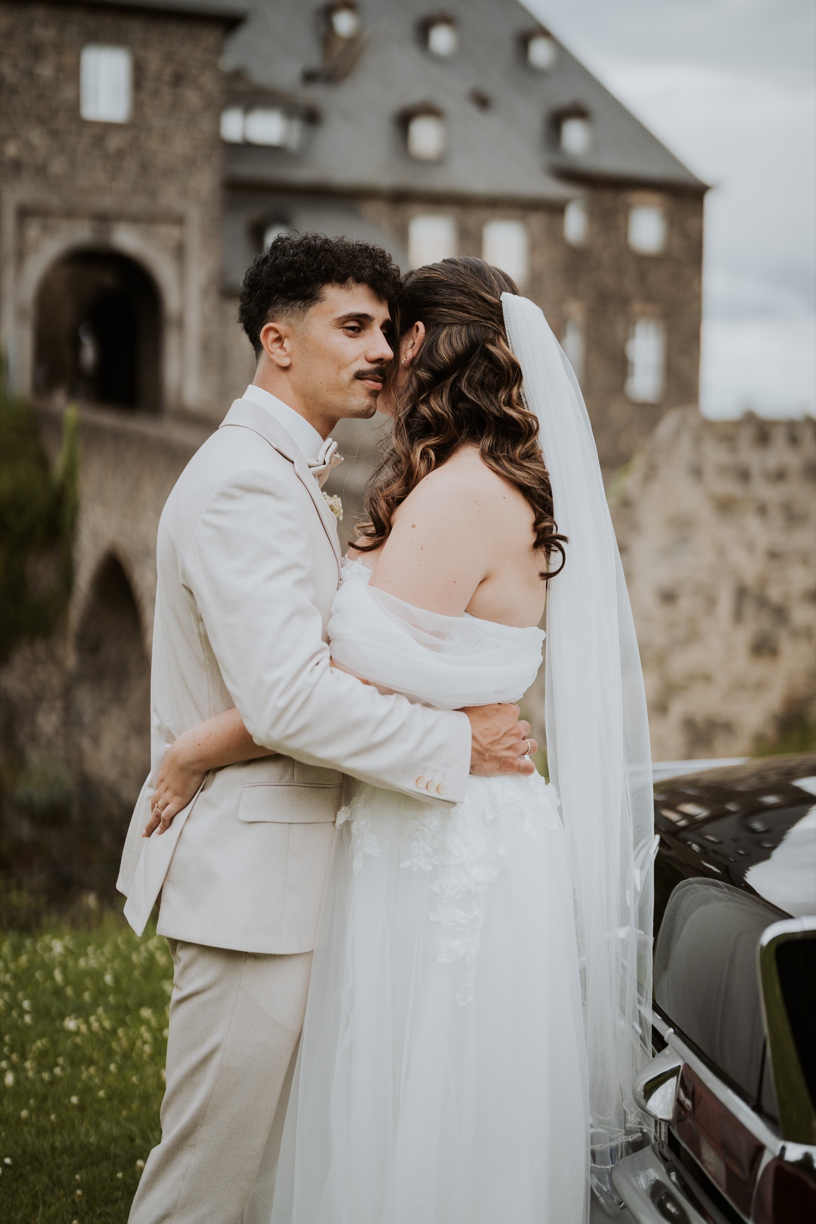 A wedding couple in conversation.